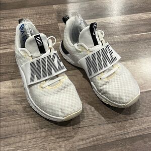 Women’s Nike White and Black Sneakers